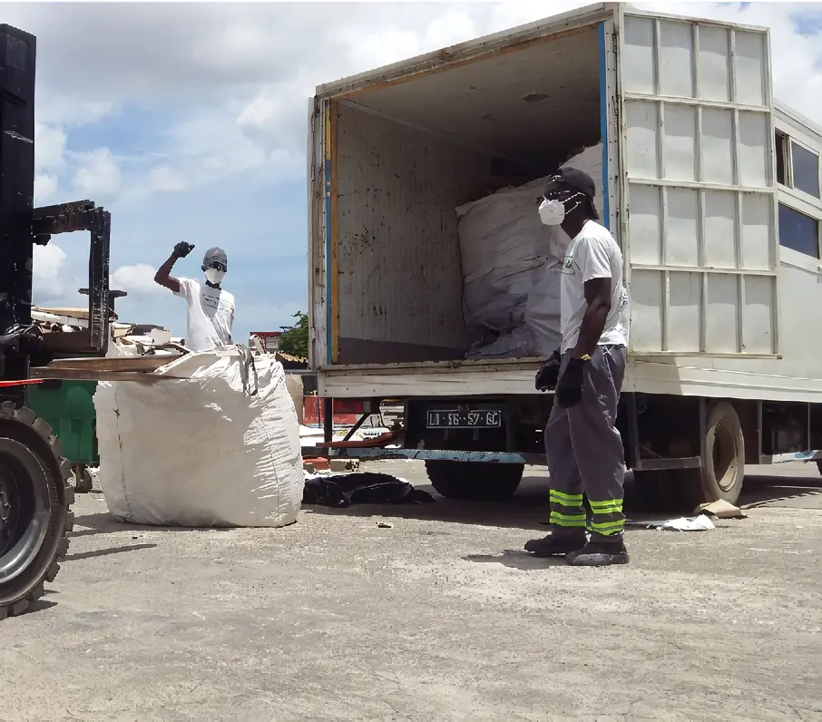 Close view of compressed plastic cubes near a recycling factory